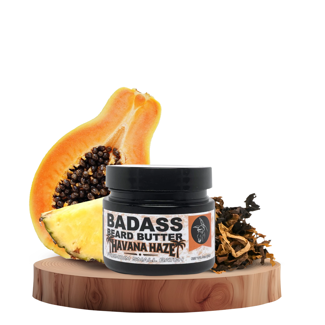 Jar of Badass Havana Maze Beard Butter with a papaya on a wooden stand